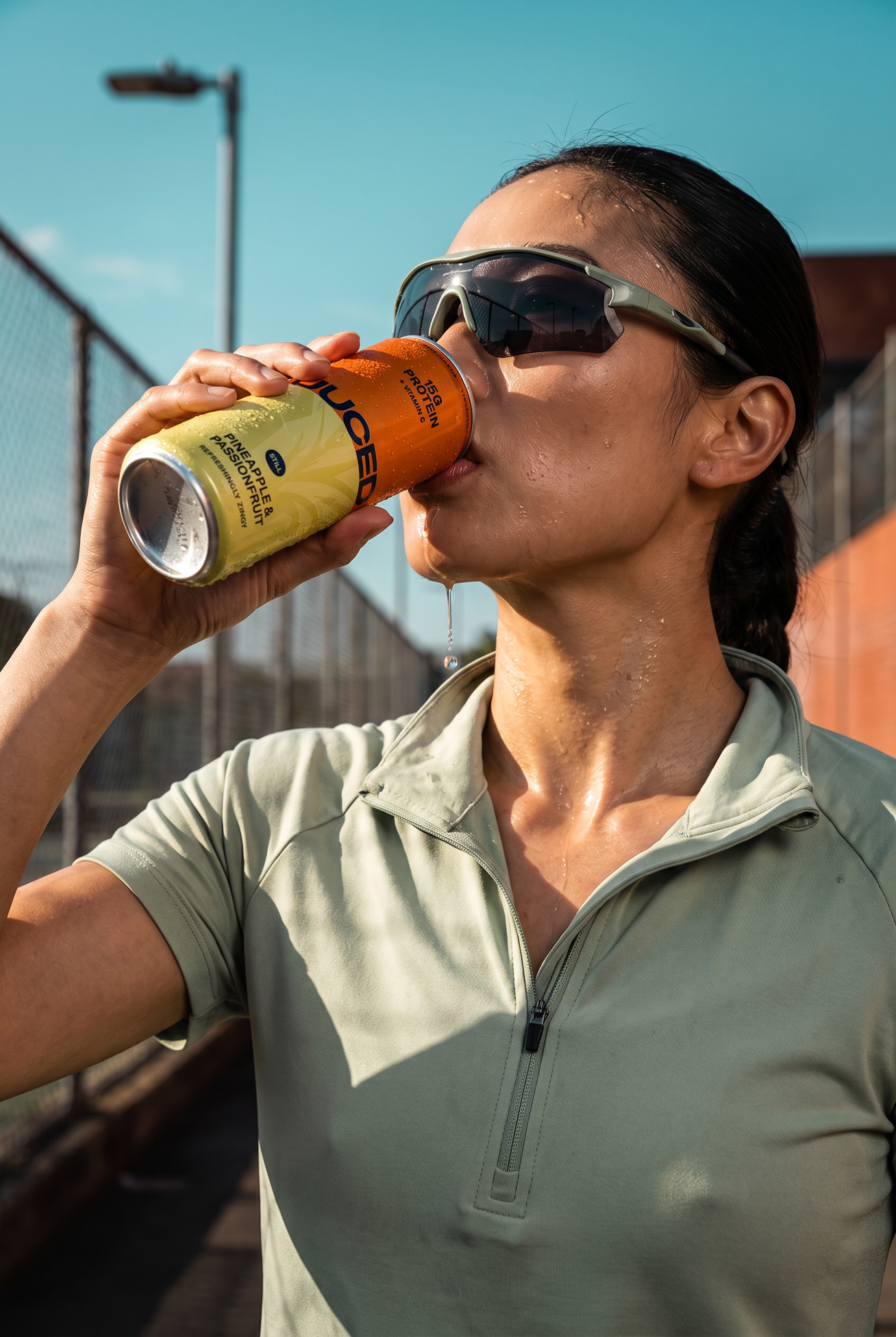 Woman drinking refreshing collagen protein drink