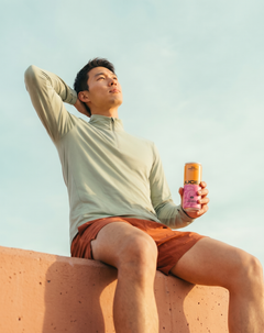 man drinking functional soft drink which is a can of refreshing JUCED