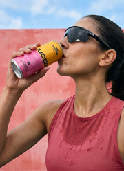 A can of JUCED clean protein drink alongside fresh fruit, positioned for health-conscious women in the UK
