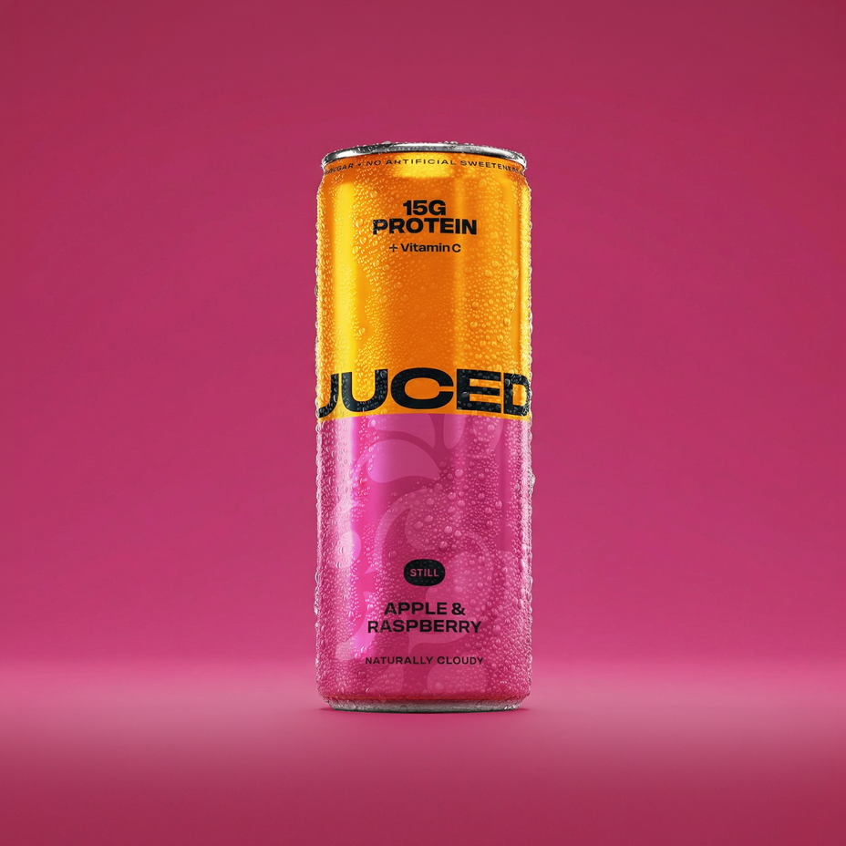 JUCED Apple & Raspberry can on a pink background