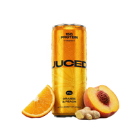 JUCED Orange & Peach can with fruit