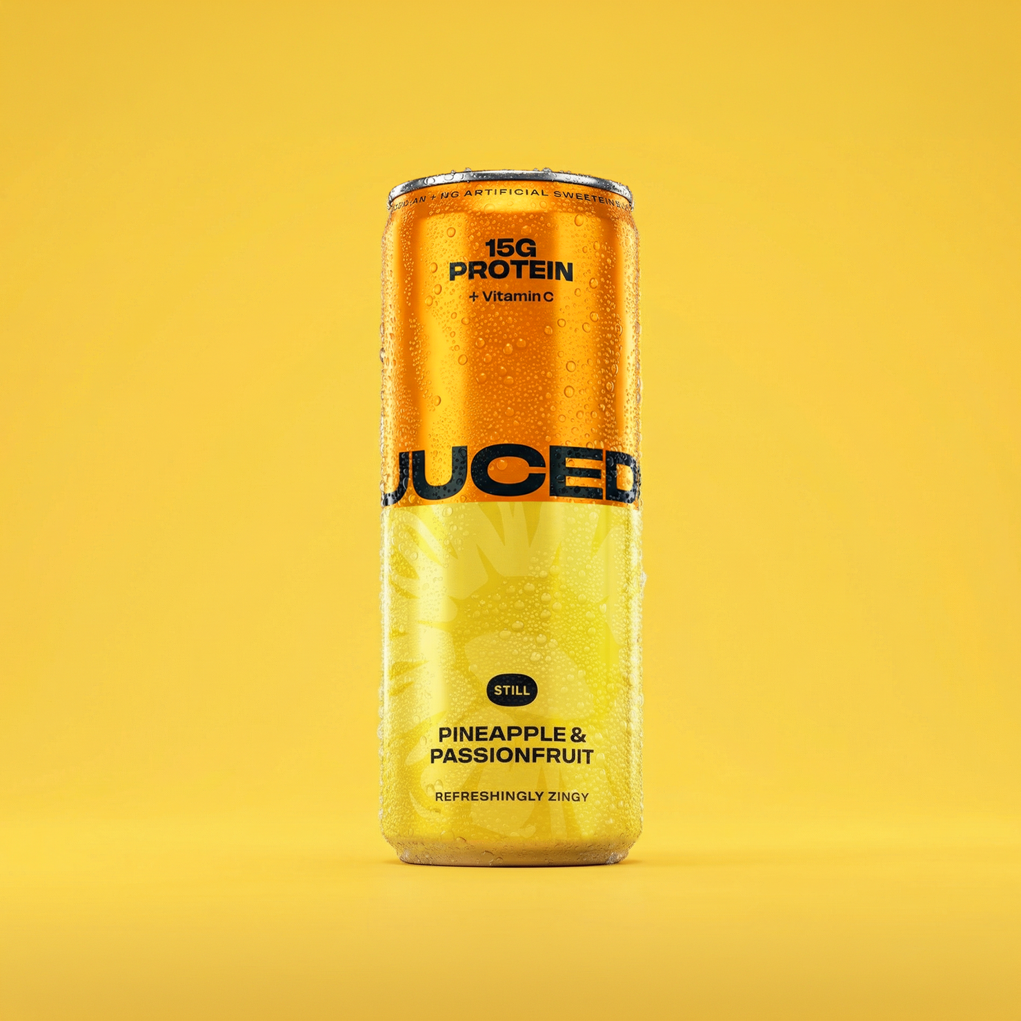 JUCED Pineapple & Passionfruit can on a yellow background